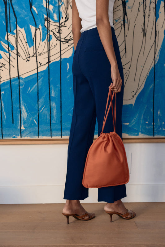 Bolsito Clara naranja de Laia Alen – Laia Alen · PORTICO Concept, Turó Park Barcelona (vista 2)