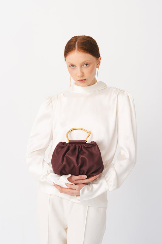 Bolso Victoria Burgundy – Carnevale Madrid · PORTICO Concept, Turó Park Barcelona