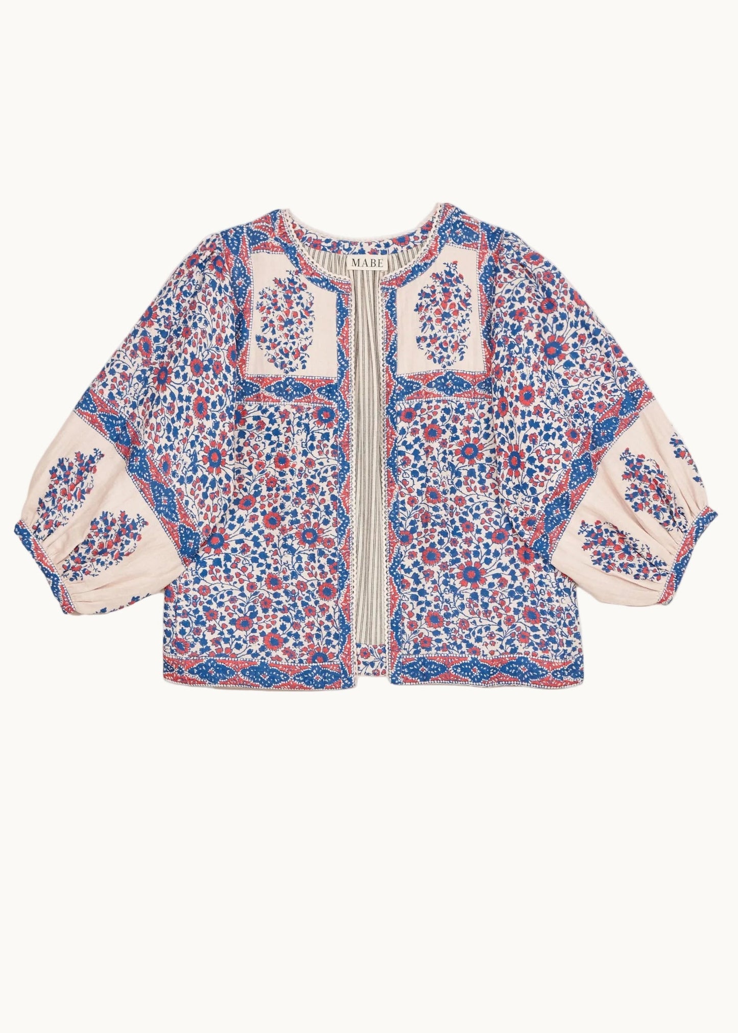 Chaqueta Della con estampado floral azul y rosa, frontal – Mabe · PORTICO Concept, Turó Park Barcelona