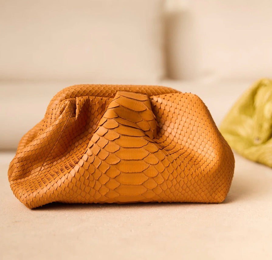 Bolso Cebú Mini de Noumad en naranja, clutch de Portico Concept