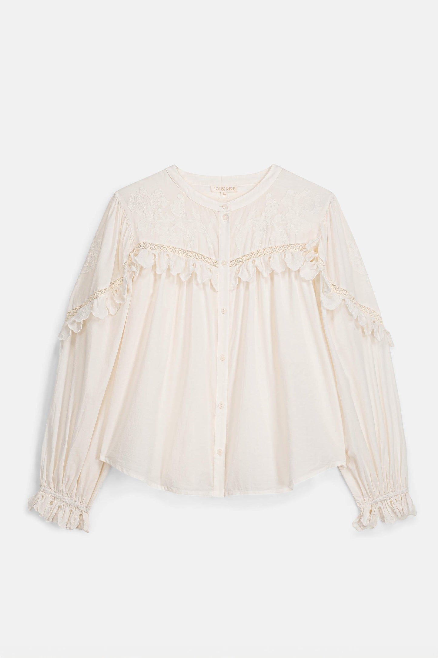 Camisa Noelianne, blusa off-white con canesú de volantes – Louise Misha · PORTICO Concept, Turó Park Barcelona