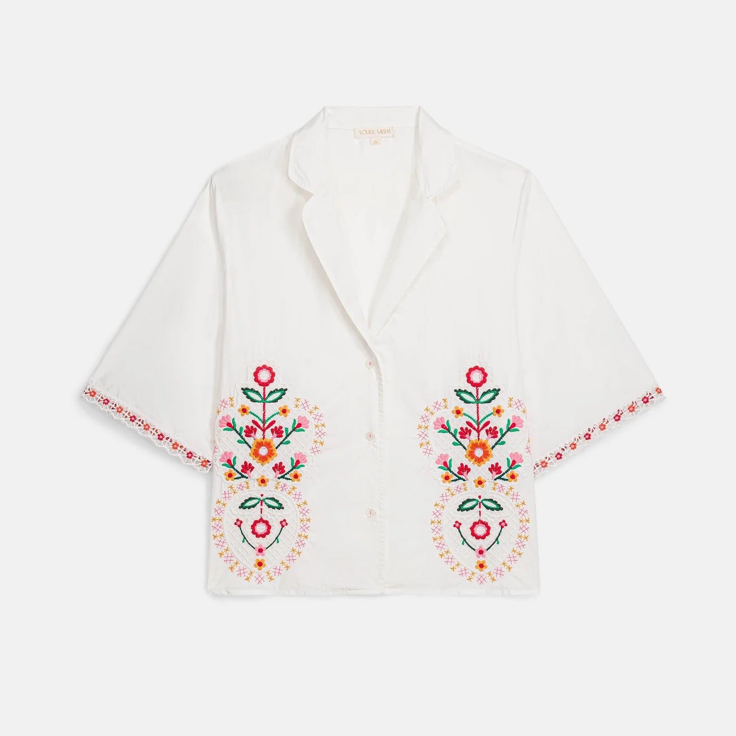 Camisa Emilius, camisa blanca de manga corta con bordado floral – Louise Misha · PORTICO Concept, Turó Park Barcelona