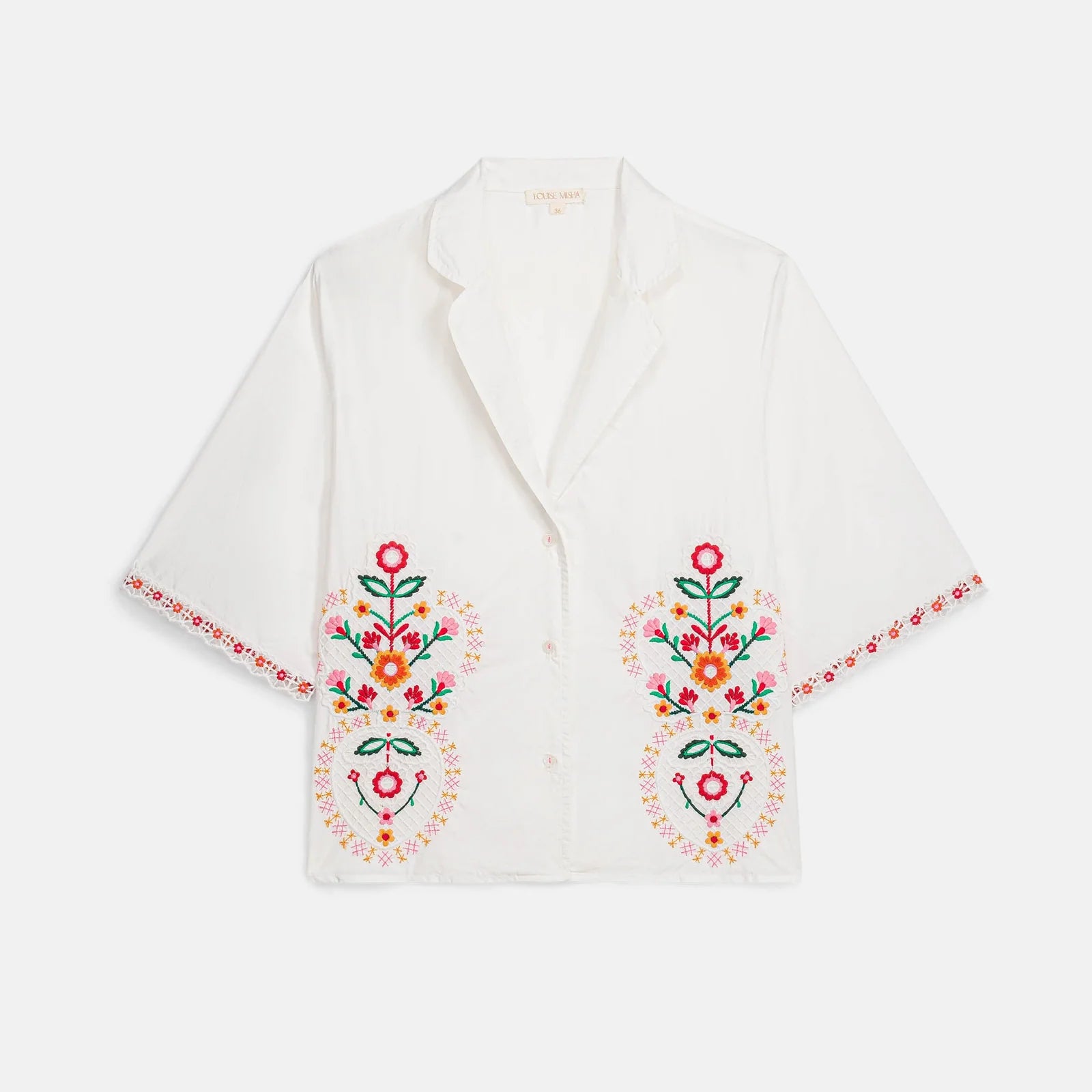Camisa Emilius, camisa blanca de manga corta con bordado floral – Louise Misha · PORTICO Concept, Turó Park Barcelona