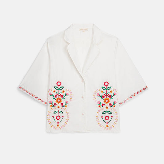 Camisa Emilius, camisa blanca de manga corta con bordado floral – Louise Misha · PORTICO Concept, Turó Park Barcelona